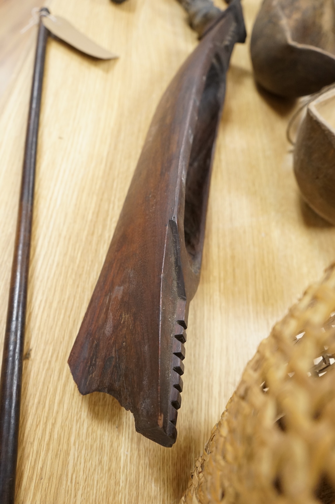 Tribal interest; A collection of various African carvings, a basket and spear